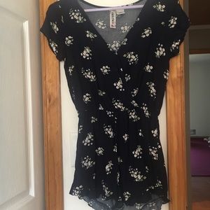 Cute navy romper with white flowers